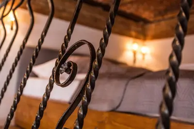 a metal fence with a heart on it at Lovenovsky Apartments in Kraków