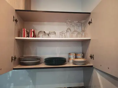 a table with plates and glasses on top of it at Wasielówka in Poręba Wielka