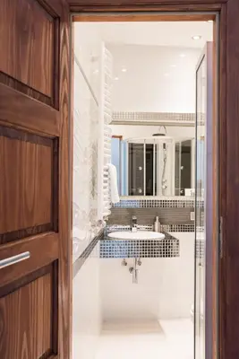 a bathroom with a sink and a mirror at Apartment Nearto Old Town Na Ustroniu street in Kraków