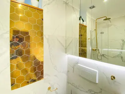 a bathroom with a shower and a mirror at FAUST Apartments in the Heart of KAZIMIERZ by MINT APARTMENT in Kraków