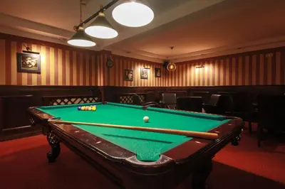 a billiard room with a pool table in it at Hotel Galicja Superior Wellness & Spa in Oświęcim