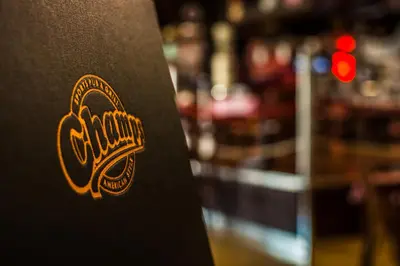 a close up of a bar badge on a counter at ParkHotel Łysoń in Inwałd