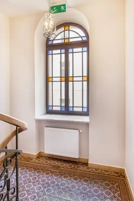 a room with a window and a radiator at Topolowa Apartment, next to Main Station in Kraków