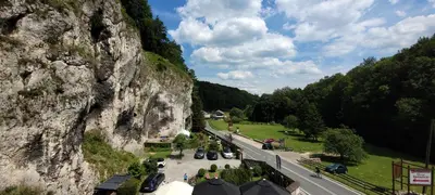 a view of a mountain with cars parked on a road at Zajazd Wernyhora in Sułoszowa