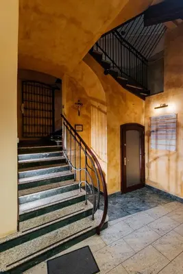 a set of stairs in an old building at Szpitalna 20 Apartment 3 in Kraków