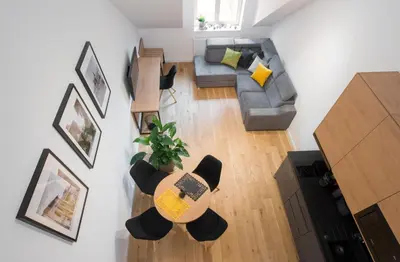 an overhead view of a living room with a guitar at Aparthotel BC 29 Residence in Kraków
