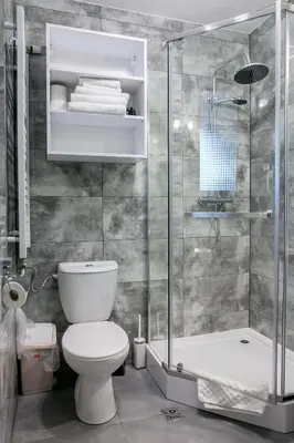 a bathroom with a shower and a toilet and a tub at Eko Hotel Na Wierzynka & Park Pinokia in Wieliczka