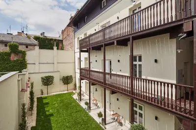 an aerial view of an apartment building with a yard at St Agnes Apartments Attic in Kraków
