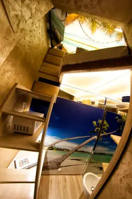 a view from the top of a room with a stairs at Yourplace XXS Apartments in Kraków
