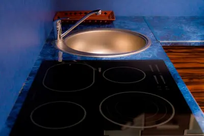 a sink in a bathroom with a counter at Apartament Jonek in Kraków