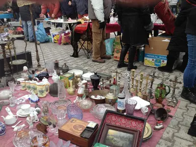 a table filled with lots of antique glass items at Angel's studio - Jewish Quarter, Old Town (AirCon) in Kraków