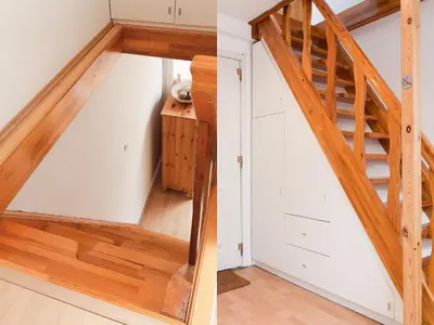 a stairwell in a tiny house with wood at Studio Smart Apartment in Kraków
