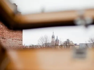 a view of a building with a clock tower at Studio Smart Apartment in Kraków
