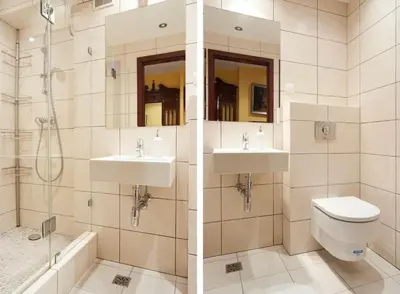 a bathroom with two sinks and a toilet and a shower at Trinity Apartment in Kraków