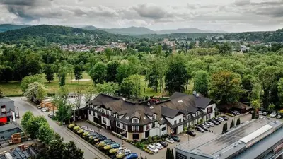 an aerial view of a large house in a town at Hotel Badura in Wadowice