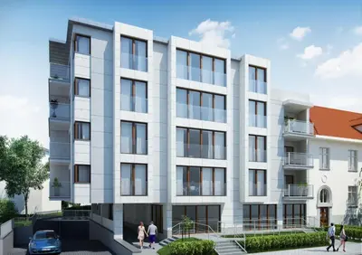 a rendering of a building with people walking in front of it at Chopin Apartments in Kraków