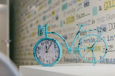a blue clock sitting on top of a table at Eight Lux View in Old Town and Free Parking in Kraków
