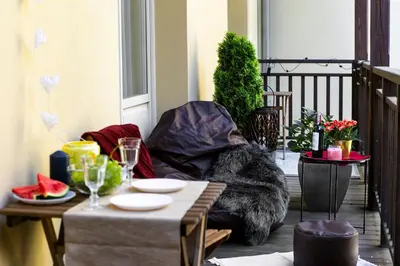 a living room with a couch and a table at Otium Old Town Sarego in Kraków