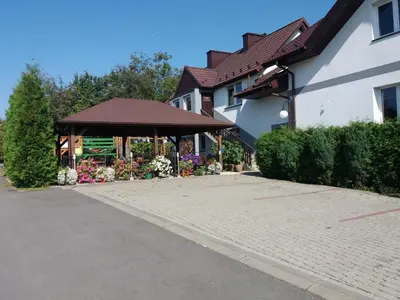 a gazebo in front of a house at U Adama in Wieliczka
