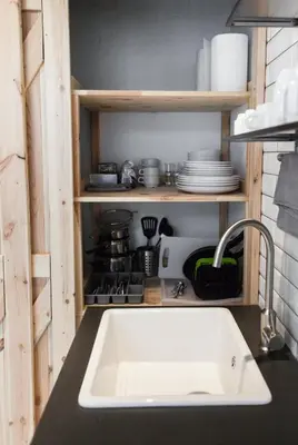 a kitchen counter with a sink in a kitchen at Modern Apartment46 / Kazimierz in Kraków
