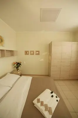 a room with two beds and a window at Standard Delegacyjny Bed & Breakfast in Dąbrowa Górnicza