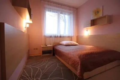 a kitchen with a counter with a computer on it at Standard Delegacyjny Bed & Breakfast in Dąbrowa Górnicza