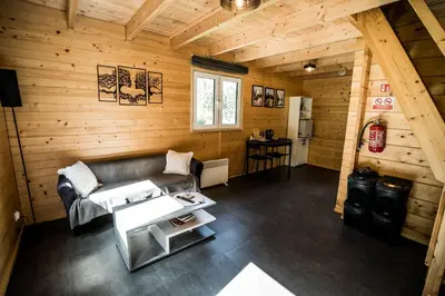 an overhead view of a living room in a log cabin at Chata 