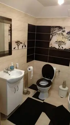a bathroom with a toilet and a sink at Michałowice Noclegi u Anety in Michałowice