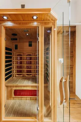 a room with a sauna with a glass door at Hotel 32 Kraków Old Town in Kraków