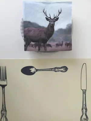 a painting of a deer and a spoon on a wall at Zamoyskiego in Kraków