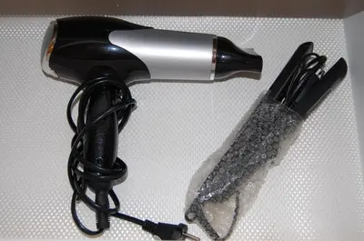 a hairdryer and a hair dryer on a table at Zamoyskiego in Kraków