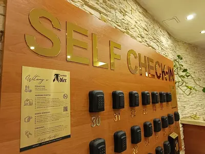 a store display of siren cell phones on a wall at Aparthotel Adler in Kraków