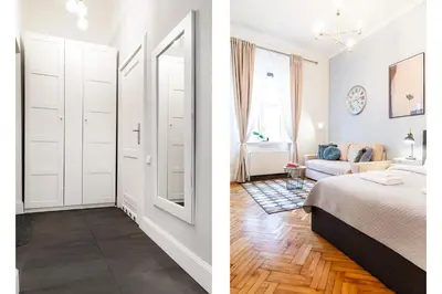 a bedroom and a living room with a bed and a mirror at Househost Apartment - Kupa 2 in Kraków