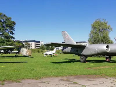 a group of old planes parked in a field at Romantic Sky Apartment- 15th floor in Kraków