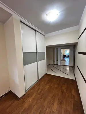 an empty room with white walls and wood floors at SILENT Main Market Square with AC in Kraków