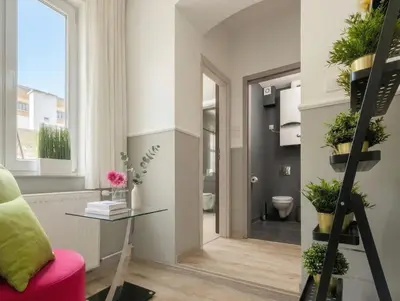 a bathroom with a shower with a toilet and a sink at Kings City - Sławkowska Apartments in Kraków