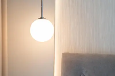 a bathroom with a sink and a shower at Glossy Apart M54 in Kraków