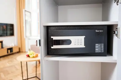 a microwave oven on a counter in a kitchen at Bentis Luxury Apartments in Kraków