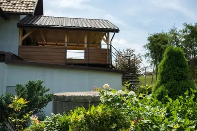 a gazebo on the side of a house at Staś -przy szkole nr 3 w Skawie in Skawa