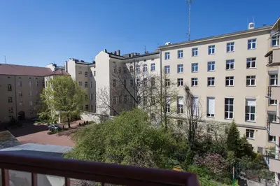 a view from a balcony of buildings at Fogra Travel Apartment in Kraków