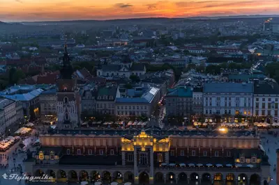 an aerial view of a city at night at MR 3 Apartments in Kraków