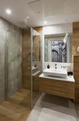 a bathroom with a sink and a shower at Silver Apartment Old Jewish Quarter in Kraków