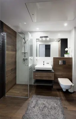 a bathroom with a sink and a toilet and a shower at City Point Apartment Old Jewish Quarter in Kraków