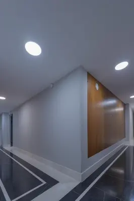 a large wall in a building with a wall at Native Apartments Augustiańska 24 in Kraków