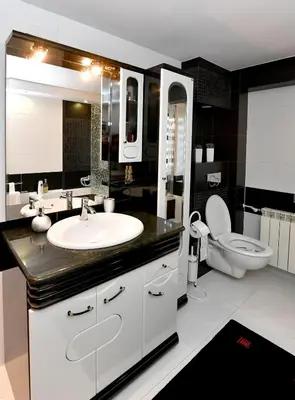 a bathroom with a sink and a toilet at Apartament Spytkowice - ENERGYLANDIA KRAKÓW OŚWIĘCIM WADOWICE in Spytkowice