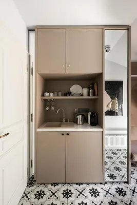 a white bathroom with a shower and a toilet at Moja apartments in Kraków