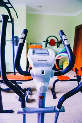 a group of exercise bikes in a gym at Hotel Górski Raj in Koninki