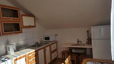 a house with solar panels on the side of it at Agrorelax - Kasina Wielka in Kasina Wielka