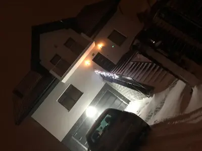 an overhead view of a building at night with a light at Holiday home Limanowa in Limanowa