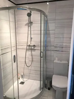 a bathroom with a shower and a toilet at Holiday home Limanowa in Limanowa
